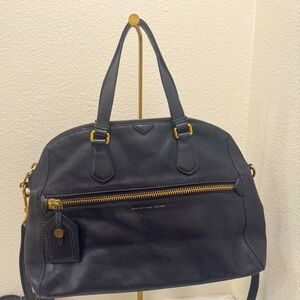 Marc by Marc Jacobs  globe trotter